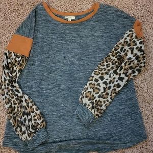 Medium thermal body shirt with cotton sleeves.